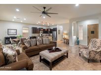 Comfortable living room showcasing open floor plan, plush seating, and stylish decor at 5649 E Desert Forest Trl, Cave Creek, AZ 85331