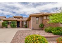 Charming single-story home featuring a landscaped front yard and a cozy, inviting facade at 3613 W Plymouth Dr, Anthem, AZ 85086