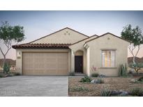 Charming single-story home featuring desert landscaping, a two-car garage, and a classic tile roof at 42895 W Vincent Dr, Maricopa, AZ 85138