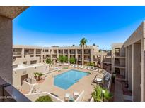 Enjoy the community pool and outdoor lounge area, perfect for relaxing and soaking up the sun at 7474 E Earll Dr # 311, Scottsdale, AZ 85251