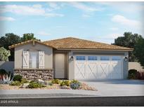 Charming single-story home featuring a two-car garage, stone accents, and a well-manicured front yard at 37125 W Prado St, Maricopa, AZ 85138