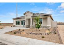 Charming single-story home featuring a desert landscape, neutral paint, and a tile roof at 10035 S Palo Verde Dr, Apache Junction, AZ 85120