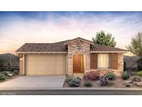 Charming single-story home featuring a stone facade, two-car garage, and well-maintained landscaping at 13530 W Copperleaf Ln, Peoria, AZ 85383