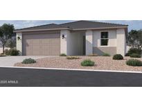 Charming single-story home with a neutral color scheme and a well-manicured front yard at 4521 S 95Th Dr, Tolleson, AZ 85353