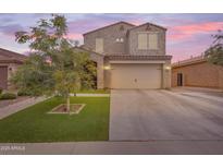 Charming two-story home featuring a well-manicured lawn and inviting curb appeal in a Gathering-friendly neighborhood at 2322 E Mews Rd, Gilbert, AZ 85298