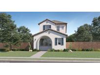 Charming two-story home with an arched porch, manicured lawn, and desert landscaping at 16381 W Weeping Willow Rd, Surprise, AZ 85387