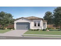 Charming single-story home with a well-manicured lawn and a two-car garage in a friendly neighborhood at 16677 W Chama Dr, Surprise, AZ 85387