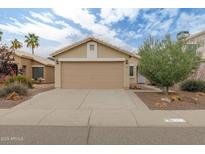 Charming single-story home featuring a desert landscape, and a two-car garage at 2112 E Donald Dr, Phoenix, AZ 85024