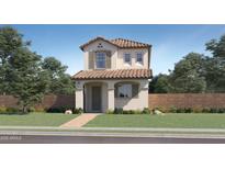 Charming two-story home showcasing a Spanish tile roof, stucco siding, and a welcoming front porch at 2944 N 98Th Ln, Phoenix, AZ 85037