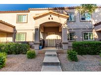 Charming condo with a cozy front porch and well-maintained desert landscaping at 125 S 56Th St # 36, Mesa, AZ 85206