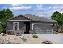 Beautiful single story home with a two car garage and modern grey color scheme at 15503 W Deanne Dr, Waddell, AZ 85355