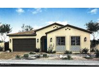 Inviting single-story home featuring a desert landscape, a two car garage, and a tile roof at 3718 E Gold Mountain Ave, San Tan Valley, AZ 85143