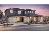 Stunning two-story home featuring a neutral color scheme, two-car garage, and well-maintained desert landscaping at 17638 W Palo Verde Dr, Litchfield Park, AZ 85340