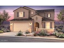 Charming two-story home with a two car garage and manicured front yard at 17644 W Palo Verde Dr, Litchfield Park, AZ 85340