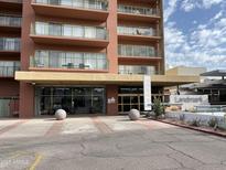 Tower Landmark condominium building featuring a welcoming entrance and well-maintained landscaping at 4750 N Central Ave # A10, Phoenix, AZ 85012