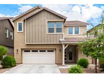 Beautiful two-story home with a two-car garage and well-maintained landscaping in a Gathering-friendly neighborhood at 734 W Winchester Dr, Chandler, AZ 85286