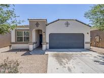 Charming single-story home featuring a two-car garage and neutral stucco facade at 2625 W Gaby Rd, Phoenix, AZ 85041