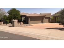 Charming, desert-landscaped home with a private gate and two-car garage, perfect for southwestern living at 15135 E Sundown Dr, Fountain Hills, AZ 85268