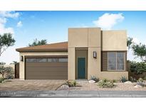 Modern single-story home featuring a stylish facade, a two-car garage, and desert landscaping at 2168 E Mill Rd, San Tan Valley, AZ 85140