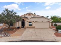 Charming single-story home with a well-maintained lawn, desert landscaping, and inviting curb appeal at 662 S Saddle St, Gilbert, AZ 85233
