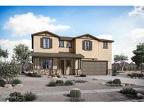 Two story home boasts a neutral color palette, two-car garage, and desert landscaping for low maintenance at 23039 E Watford Dr, Queen Creek, AZ 85142