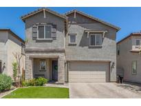 Beautiful two-story home featuring a neutral color palette, well-maintained landscaping, and a two-car garage at 11526 E Shepperd Ave, Mesa, AZ 85212