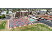 An aerial view of community amenities including pickleball courts and pool at 515 S Parkcrest -- # 531, Mesa, AZ 85206