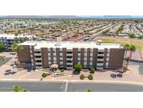 Attractive condo building with a well-maintained entrance, landscaping, and visible balconies at 515 S Parkcrest -- # 531, Mesa, AZ 85206