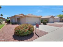 Charming single-story home with desert landscaping and a two-car garage at 11207 W Turney Ave, Phoenix, AZ 85037