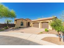 Charming home featuring a three-car garage and a desert landscaped front yard at 1526 E Hazel Dr, Phoenix, AZ 85042