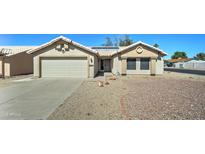 Charming single-story home featuring a low-maintenance yard and a two-car garage at 19808 N 3Rd Ave, Phoenix, AZ 85027