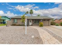 Charming single-story home featuring a stone walkway and desert landscaping at 711 W El Alba Way, Chandler, AZ 85225