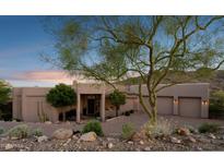Charming home with desert landscaping, a brick driveway, and a mountain backdrop at 15045 E Sundown Dr, Fountain Hills, AZ 85268