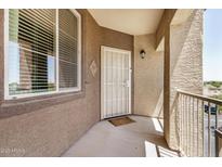 Inviting covered front porch with security door, natural light and unit number 1091 at 10136 E Southern Ave # 3091, Mesa, AZ 85209