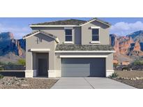 Two story home with neutral paint, gray trim, gray roof, and mountains in the background at 1785 W Solstice Ave, Apache Junction, AZ 85120