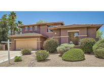 Beautiful two-story home with a two-car garage and low maintenance desert landscaping at 6350 S Four Peaks Pl, Chandler, AZ 85249