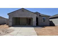 Unfinished home exterior showing the driveway and garage at 5575 E Mearn Rd, San Tan Valley, AZ 85140