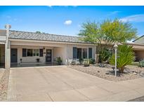 Charming single-story home featuring a low-maintenance desert landscape and covered parking at 7630 E Pasadena Ave, Scottsdale, AZ 85250