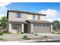 Charming two-story home showcasing a neutral color palette, attached garage, and low maintenance desert landscaping at 24232 W Agora Ln, Buckeye, AZ 85326