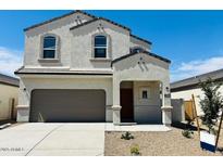 Charming two-story home featuring a neutral color palette, arched windows, and a spacious two-car garage at 5058 E Umber Rd, San Tan Valley, AZ 85143