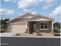 Charming single-story home featuring a two-car garage and inviting front porch at 9544 W Parkway Dr, Tolleson, AZ 85353