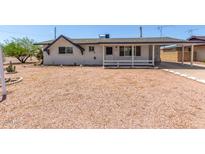 Charming single-story home with desert landscaping and covered parking at 126 N 58Th St, Mesa, AZ 85205
