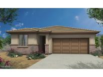 Charming single-Gathering home with a two-car garage, landscaped front yard, and a neutral color palette at 18231 W Soft Wind Dr, Surprise, AZ 85387