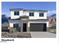 A two-story home with a two-car garage, showcasing a modern design and mountain views at 7385 W Buckhorn Trl, Peoria, AZ 85383