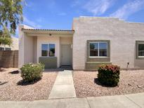 Charming single-story home with well-maintained landscaping and neutral-toned stucco exterior at 2300 E Magma Rd # 74, San Tan Valley, AZ 85143