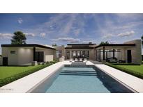 Inviting pool area with modern outdoor seating and sleek architectural design against a bright sky backdrop at 14034 N 81St St, Scottsdale, AZ 85260