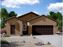 Charming single-story home featuring a two-car garage, desert landscaping, and a welcoming front entrance at 47165 W Coe St, Maricopa, AZ 85139