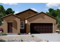 Charming single-story home with a well-maintained front yard and a two-car garage at 1959 E Bucking Bronco Dr, San Tan Valley, AZ 85140