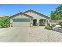 Charming single-story home with a well-maintained front yard and covered porch at 2101 S Meridian Rd # 250, Apache Junction, AZ 85120