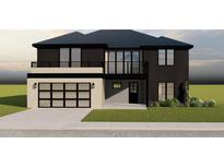 Modern two-story home featuring a two-car garage, private balcony, and manicured landscaping at 3423 E Campbell Ave, Phoenix, AZ 85018